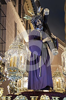 Jesus del Gran Poder with the cross on the shoulder in the Holy Week in Seville photo