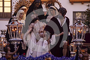 Passage of mystery of the brotherhood of Santa Marta in the Holy Week of Seville, Spain photo