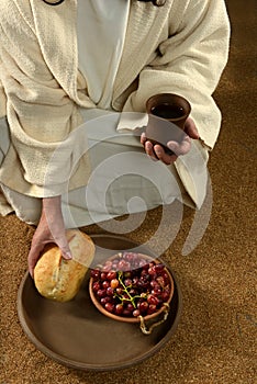 JEsus Hands Holding Communion