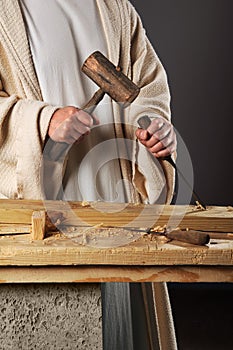 Jesus Hands With Mallet and Chisel photo