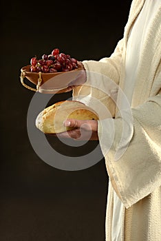 Jesus Holding Grapes and Wine