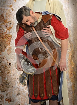 Jesus Holding Roman Soldier photo