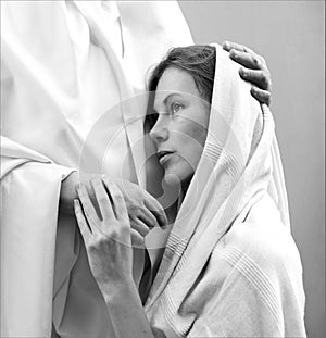 Jesus hugging a praying woman