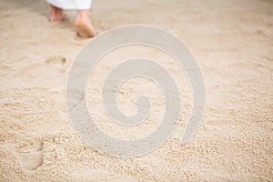 Jesus leaving footprints in sand photo