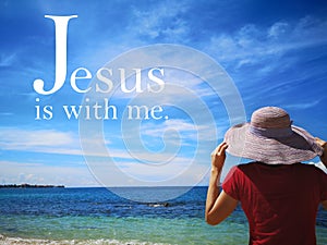 Jesus is with me with background ocean view and a lady look up to the sky design for Christianity.