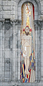 Jesus mosaic left of entry of the Lourdes Basilica