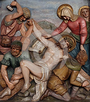 Jesus is nailed to the cross, 11th Stations of the Cross