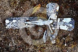 Jesus on old and weathered broken cross