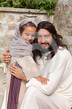 Jesus playing with a little girl