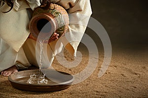 Jesus Pouring Water