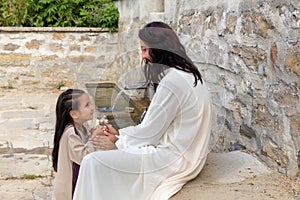 Jesus praying with a little girl