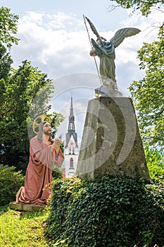 Jesus is praying to Angel and God, statue on Kalvarienberg, Calvary Mountain, Bad Tolz, Bavaria, Germany