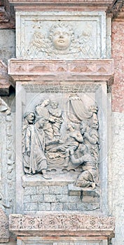 Jesus raised Lazarus by Casario, left door of San Petronio Basilica in Bologna photo