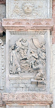 Jesus raised Lazarus by Casario, left door of San Petronio Basilica in Bologna photo
