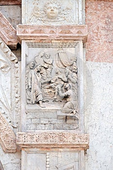 Jesus raised Lazarus by Casario, left door of San Petronio Basilica in Bologna photo