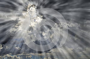 Jesus in Sky Clouds with Rays of Light