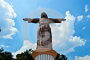 Jesus statue with a blue sky