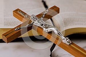 Jesus on way to God through prayer Holy Bible and the crucifix