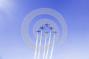 Jet airplanes doing maneuvers in the sky