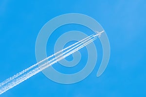 Jet in the blue sky. Diagonal view. Aircraft travel