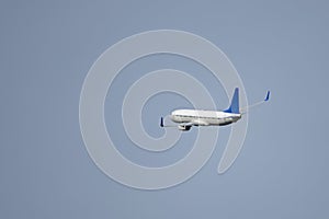 a jet cargo plane a few minutes after takeoff turning in the air