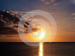 Jet Contrail over Lake Okeechobee Sunset