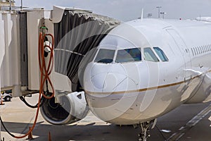 jet engine against a plane at the airport on loading