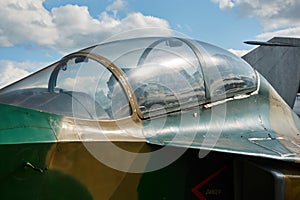 Jet fighter at the airport. The pilot`s cockpit closeup