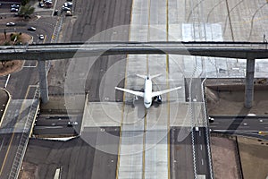 Jet over road and under bridge