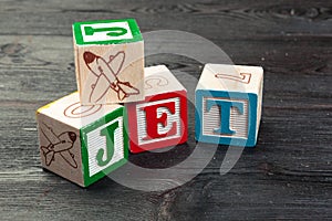 Jet printed on three wooden dice. Transportation concept