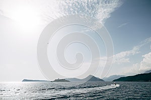 Jet ski sails to the Mamula island in the Kotor Bay. Montenegro