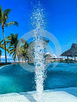 Water Spray Resort Pool Tropical Scene