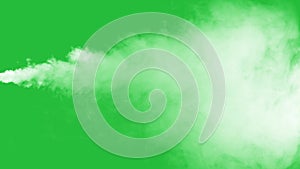 Jet of Vapour Steam Under Pressure on Green Background. Clouds of thick jet swirl. Dry smoke fog. Gaseous state