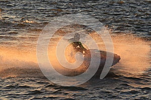 Jet watercraft skims across the waves