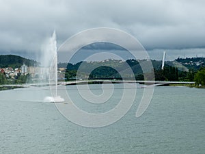 jets or fountains of water projected from the surface of the Mondego River in the city of Coimbra.