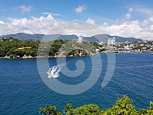 Jetski sailing in the sea from La Roqueta Island