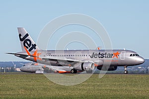Jetstar Airways Airbus A320 airliner landing at Sydney Airport.