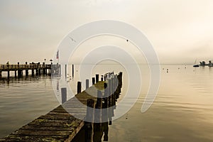 Jetty on Ammersee, foggy day, landscape, blue sky