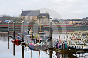 Jetty and boats on the River Clyde in Govan photo