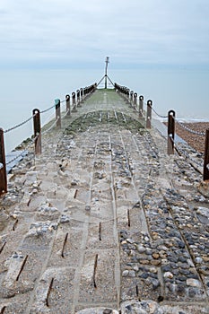 Jetty on the coastline in Hove, Sussex, UK. Photographed in a cold winter`s day