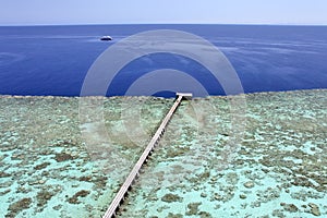 Jetty on a coral reef