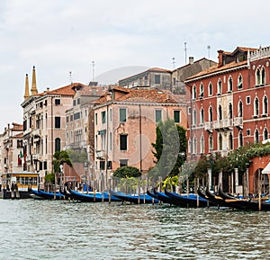 Jetty with gondolas on a canal in Venice, Italy