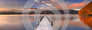 Jetty in Lake Chuzenji, Japan at sunrise in autumn