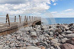 Jetty at pebbles beach near Canico at Portugese Madeira Island