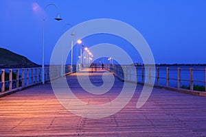 Jetty promenade summer night blur