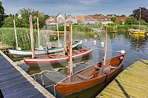 Jetty with sailing boats in Holm village of Schleswig