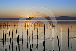 Jetty of saler lake at sunset, in the lagoon