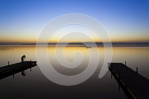 Jetty of saler lake at sunset, in the lagoon