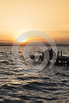 Jetty of saler lake at sunset, in the lagoon