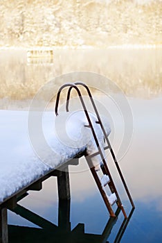 Jetty with scale under snow